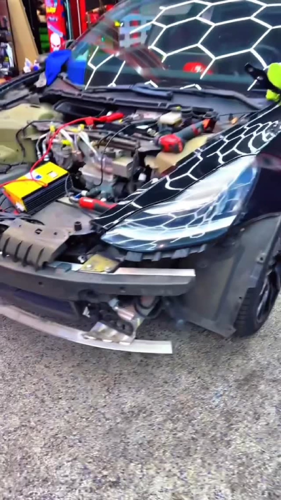 Tesla front end disassembled for body work