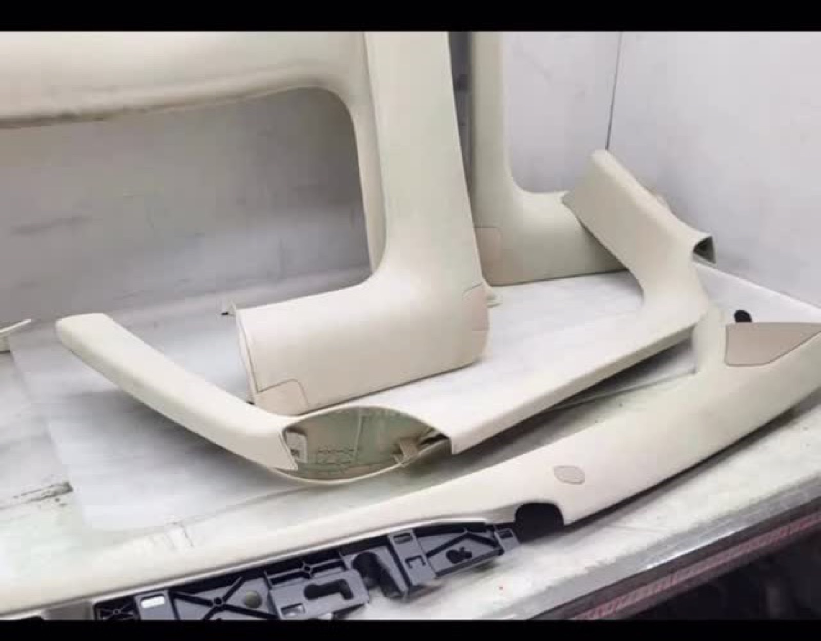Model X seats being reupholstered